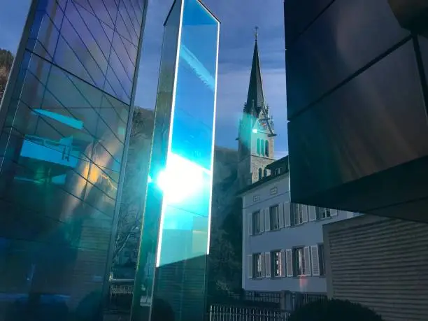 Vaduz Cathedral and Glass monument in Vaduz town capital of Liechtenstein kingdom, tiny country in Europe