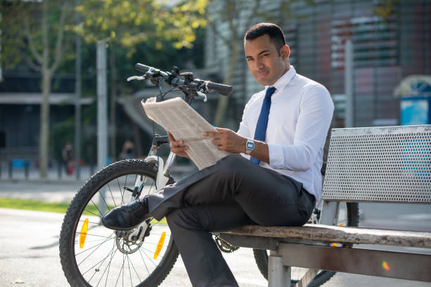 istock Content young manager resting in urban park 913717352