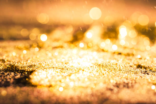 istock Sprinkle glitter gold dust in the dark textured abstract background elegant for Merry christmas and Happy new year 913717462