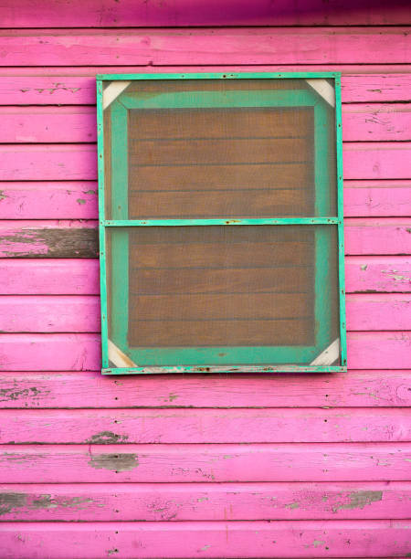 istock Mahahual Caribbean pink wood painted wall 913718076