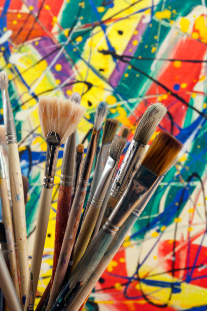 istock Much used artists paint brushes 913720526