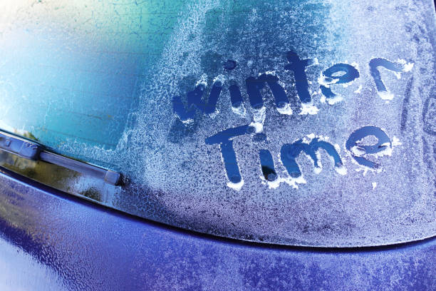 istock Winter time handwritten on frozen back car window 913722954