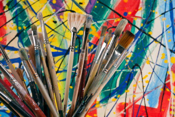 istock Much used artists paint brushes 913726132