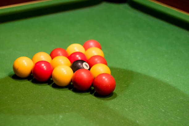 istock Pool balls set up on a pool table, taken at an angle 913726812
