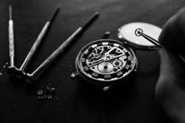 istock Watchmaker is repairing the mechanical watches in his workshop 913728982