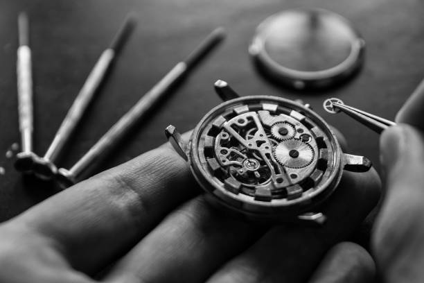 istock Process of installing a part on a mechanical watch, watch repair 913729040
