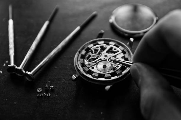istock Process of installing a part on a mechanical watch, watch repair 913729082