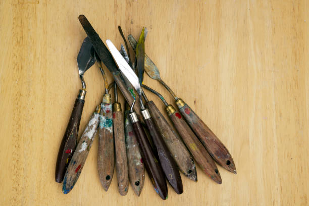 istock Much used artists palette knives 913729130