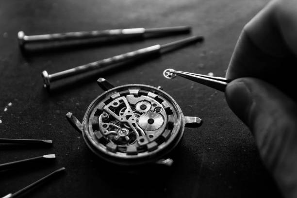 istock Process of installing a part on a mechanical watch, watch repair 913729440