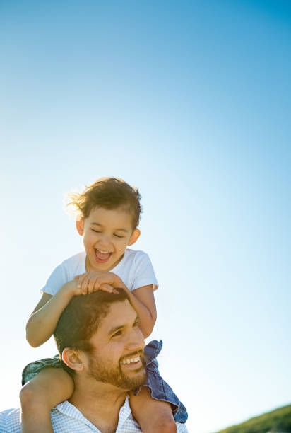 istock Father and daughter spending time together outside in the sun 913732576