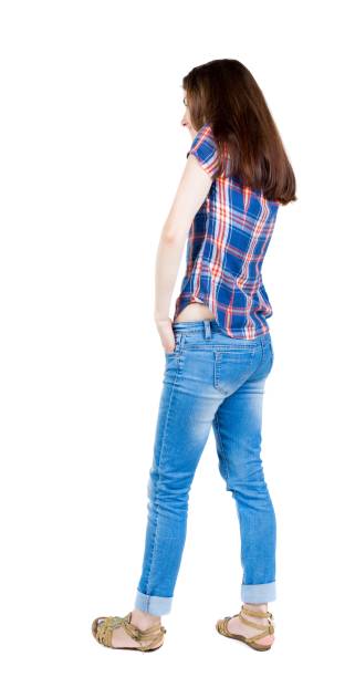 istock back view of standing young beautiful  woman. 913734042
