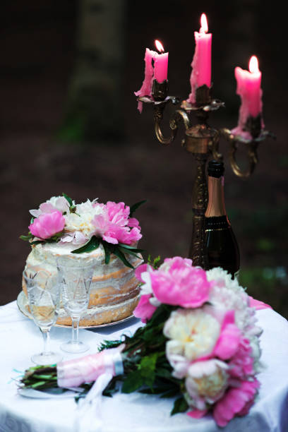 istock beautiful wedding decorations champagne flowers and cake 913740354