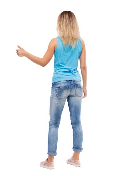 istock Back view of  woman thumbs up. 913741024