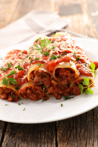 istock canneloni with beef and tomato sauce 913741782