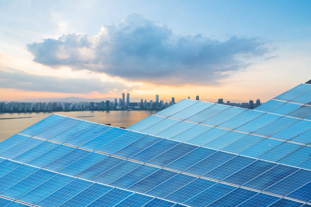 istock solar panels with cityscape of singapore 913743326