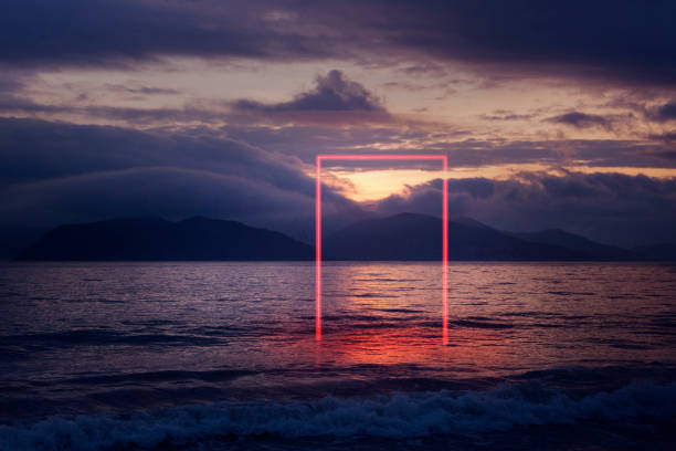 istock geometric red neon glowing rectangular gate in the sea against the background of the mountains 913745554