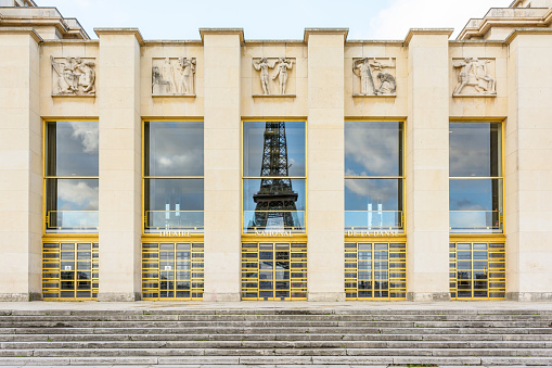 Paris, France - December 18, 2017: Front view of the Art Deco style facade of the Grand Foyer of the Theatre National de Chaillot, located in the Chaillot palace, opposite the Eiffel tower.