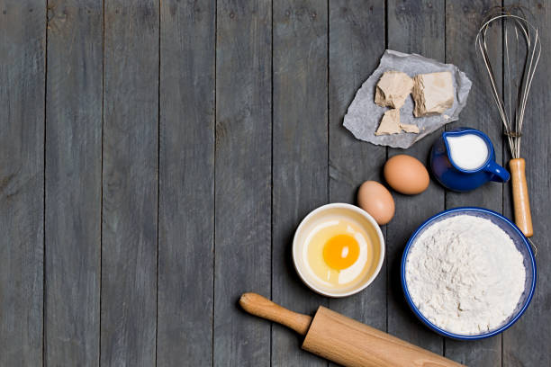 istock Ingredients cakes on a black background. Free space for your text. 913745664