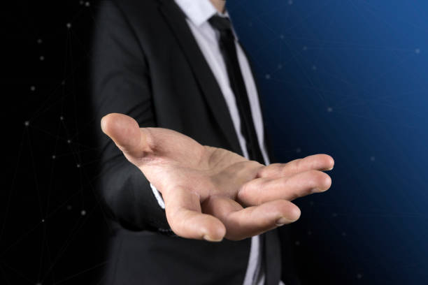 istock Businessman without head holding something without theme 913746054