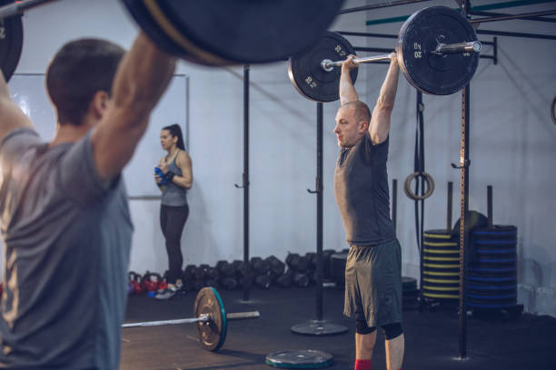 istock Group weightlifting in gym 913746380