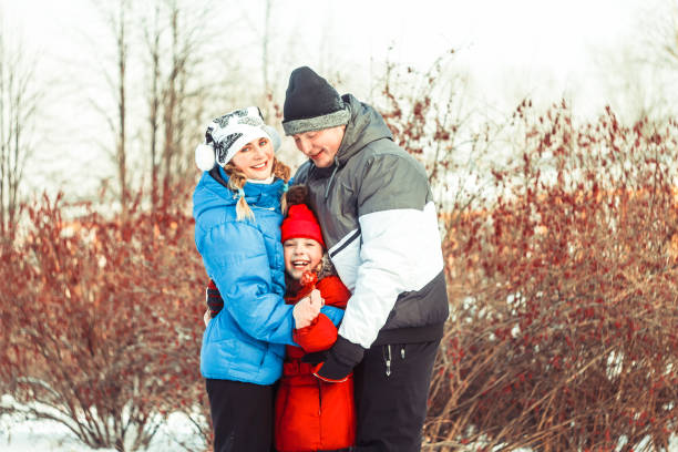 istock family winter in the snow 913746570