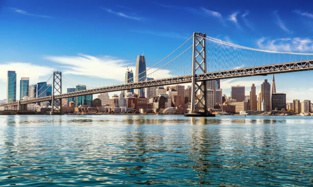 San Francisco on sunny day Downtown San Francisco and Oakland Bay Bridge on sunny day northern california stock pictures, royalty-free photos & images