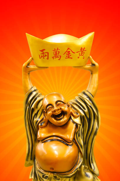 istock Statue of happy golden budda 913753232
