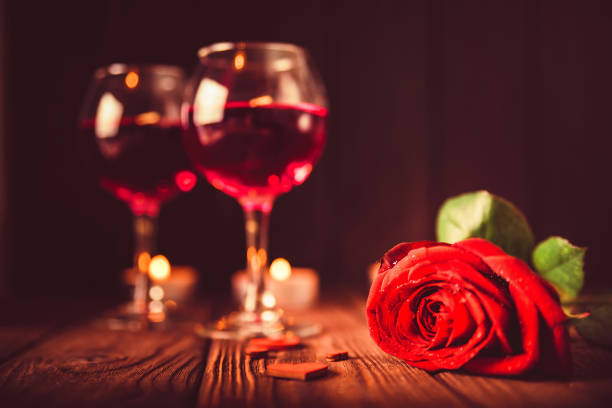 istock Valentine's day background with wine, candles 913753850