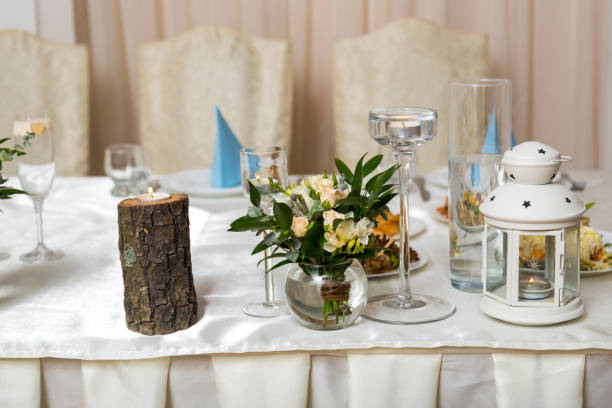 istock Beautiful wedding table for newlyweds is illuminated by candles 913754520