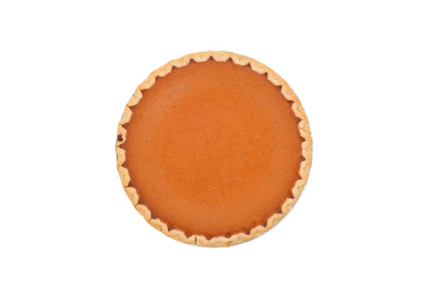 whole pumpkin pie isolated white background