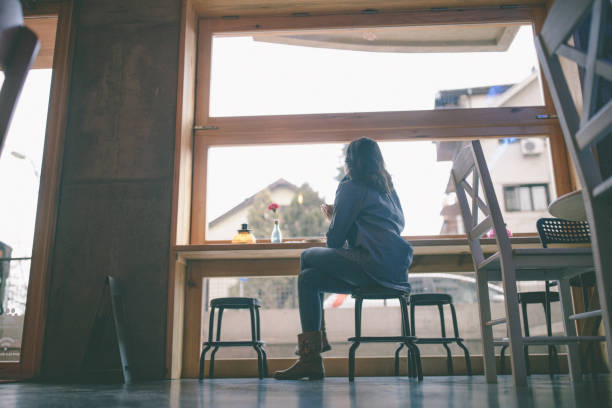 istock Just a girl in a bar 913769370