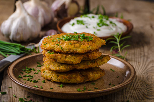istock Potato pancakes with sour cream 913770780