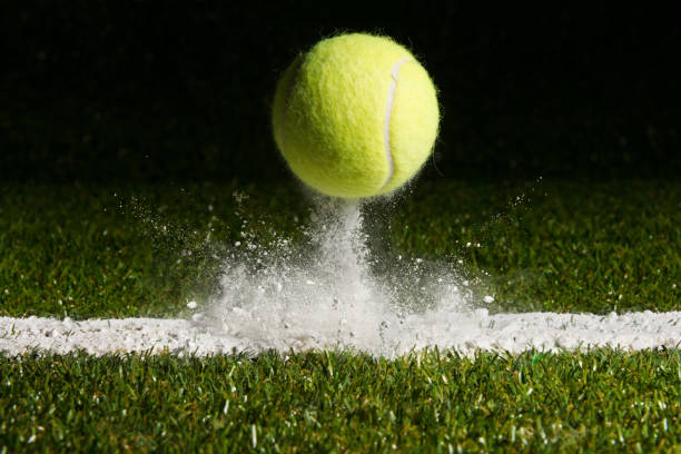 Match point Match point with a tennis ball hitting the line tennis ball stock pictures, royalty-free photos & images