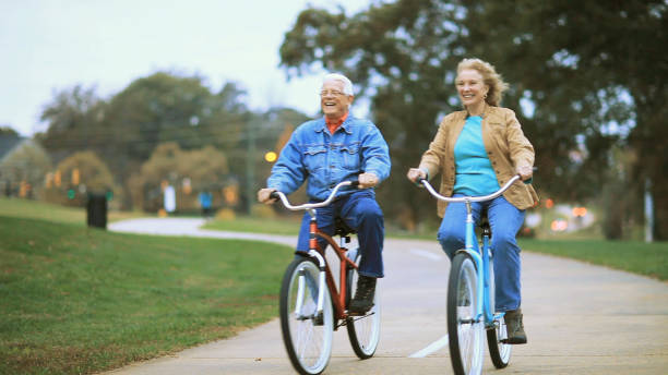 istock Senior couple with bicycles. 913784260