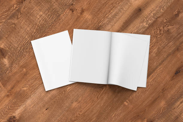 Blank magazine pages with bent glossy paper Blank magazine pages with bent glossy paper and blank cover on wooden background. Open and closed. 3d illustration rolled up magazine stock pictures, royalty-free photos & images