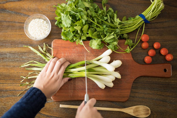 Woman preparing food in kitchen