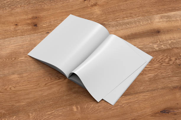 istock Blank magazine pages with bent glossy paper 913786498