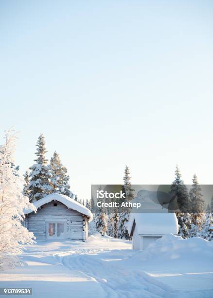 Wooden Hut In A Snowy Sunny Landscape Stock Photo - Download Image Now - Swedish Lapland, Old, Rural Scene