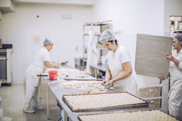istock Women in bakery making food 913792670