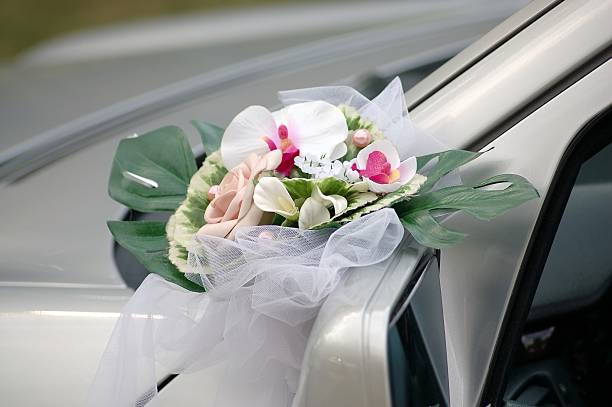istock flowers on the wedding car 91380088