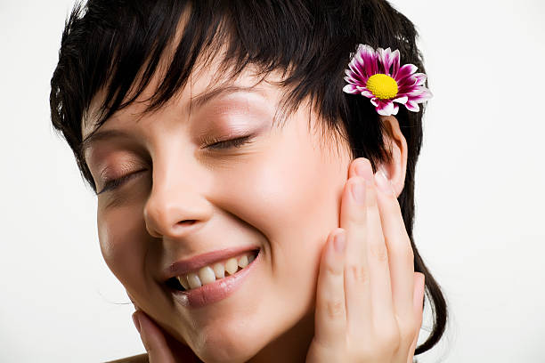 istock Close-up of beautiful face with flowers 91380501