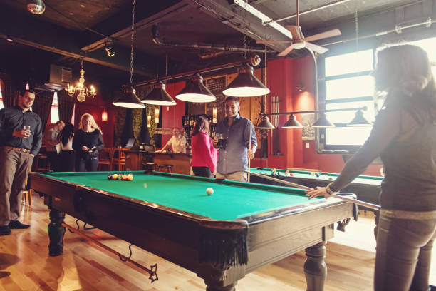 istock Coworkers hanging out in a bar 913805624