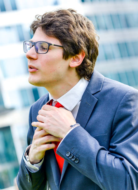 istock Young boy with glasses standing outdoor 913805634