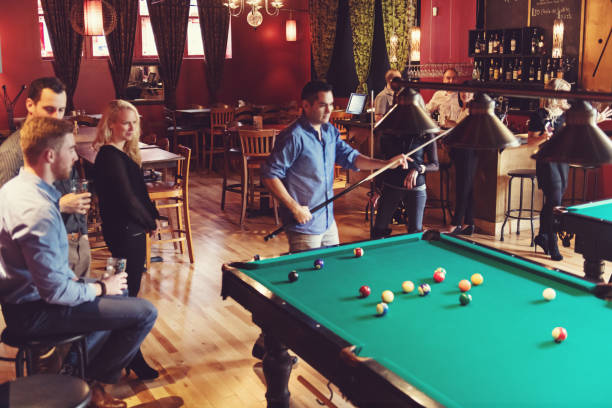 istock Coworkers hanging out in a bar 913807716