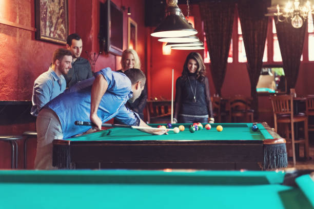 istock Coworkers hanging out in a bar 913807762