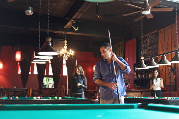 istock Coworkers hanging out in a bar 913807970