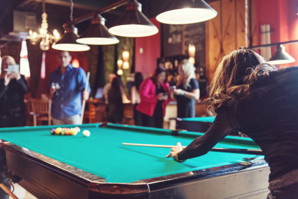 istock Coworkers hanging out in a bar 913807980