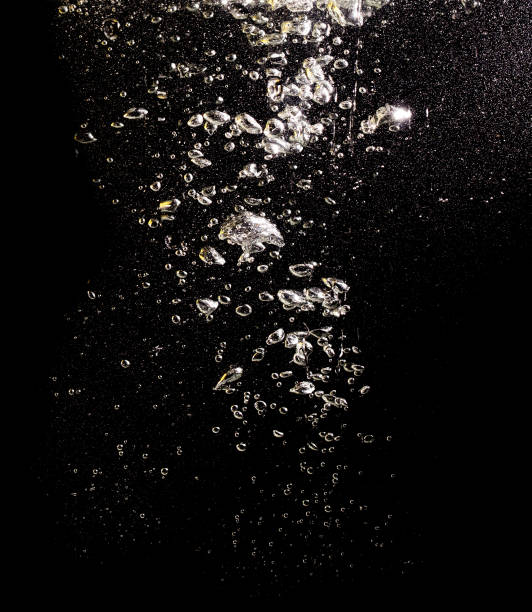 istock bubbles with air in water on a black background 913808124