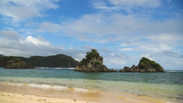 istock Tropical beach, blue sky, clouds. Catanduanes, Philippines 913808388