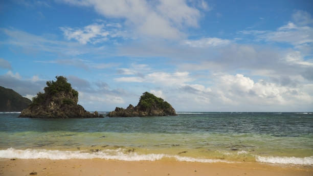 istock Tropical beach, blue sky, clouds. Catanduanes, Philippines 913808934